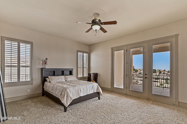 6664 Tuscany Ridge Dr, El Paso, TX 79912 - carpeted bedroom with access to exterior, baseboards, french doors, and ceiling fan