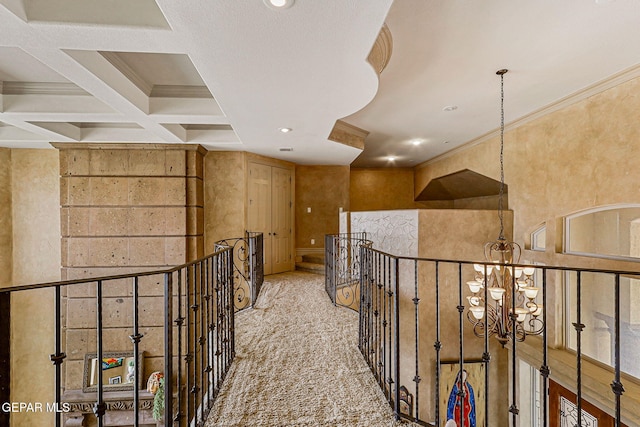 6664 Tuscany Ridge Dr, El Paso, TX 79912 - corridor featuring a chandelier, ornamental molding, recessed lighting, carpet floors, and beamed ceiling