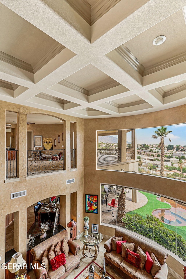 6664 Tuscany Ridge Dr, El Paso, TX 79912 - building lobby featuring coffered ceiling, beam ceiling, and ornamental molding