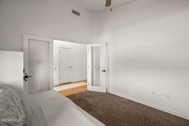 14328 N Cave Dr, El Paso, TX 79938 - bedroom with a high ceiling, a ceiling fan, carpet floors, and baseboards