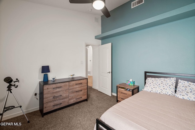 14328 N Cave Dr, El Paso, TX 79938 - bedroom with dark colored carpet, a ceiling fan, and baseboards