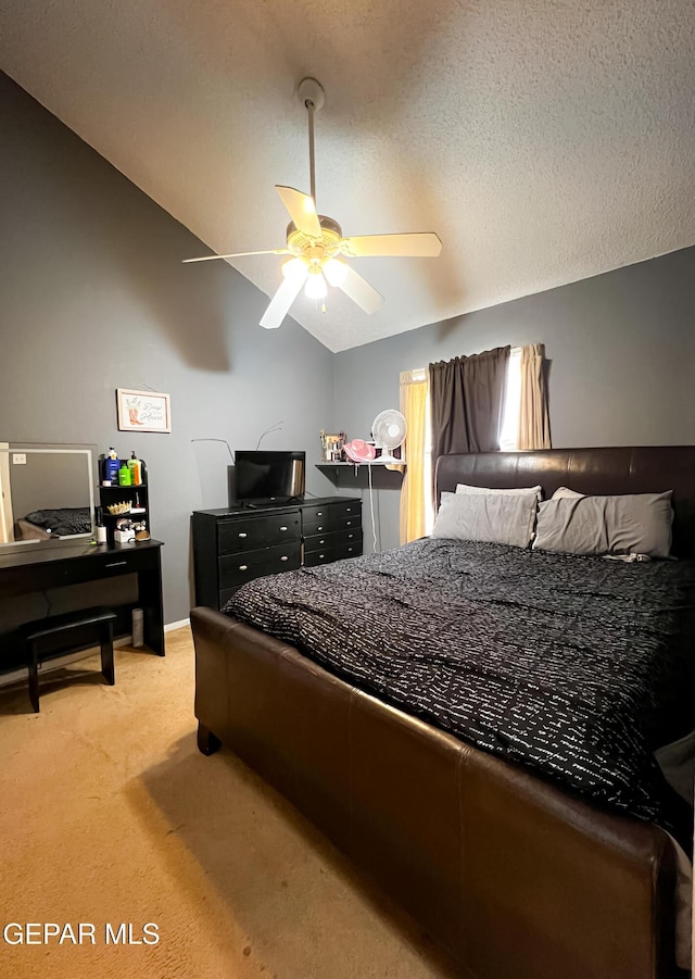 2445 Nancy Mcdonald Dr, El Paso, TX 79936 - bedroom featuring light carpet, lofted ceiling, and a ceiling fan