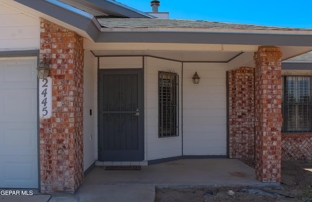2445 Nancy Mcdonald Dr, El Paso, TX 79936 - entrance to property featuring roof with shingles