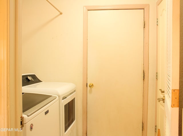 2445 Nancy Mcdonald Dr, El Paso, TX 79936 - washroom with separate washer and dryer