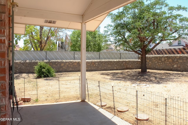 2445 Nancy Mcdonald Dr, El Paso, TX 79936 - view of patio with a fenced backyard