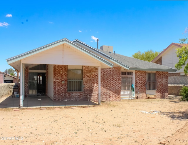 2445 Nancy Mcdonald Dr, El Paso, TX 79936 - back of house featuring a patio area and brick siding