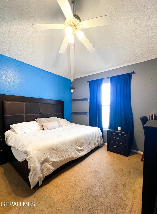 2445 Nancy Mcdonald Dr, El Paso, TX 79936 - bedroom featuring carpet, ceiling fan, and a textured ceiling
