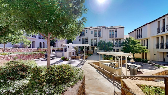 332 Vin Almoradi Ct, El Paso, TX 79912 - surrounding community featuring a pergola, a patio, and a residential view