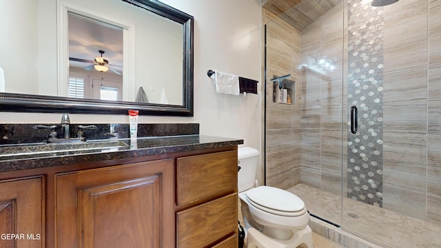 332 Vin Almoradi Ct, El Paso, TX 79912 - bathroom with a ceiling fan, a stall shower, toilet, and vanity