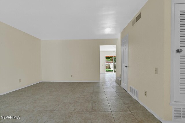 191 Mulberry Ave Unit G, El Paso, TX 79932 - unfurnished room with light tile patterned floors and baseboards