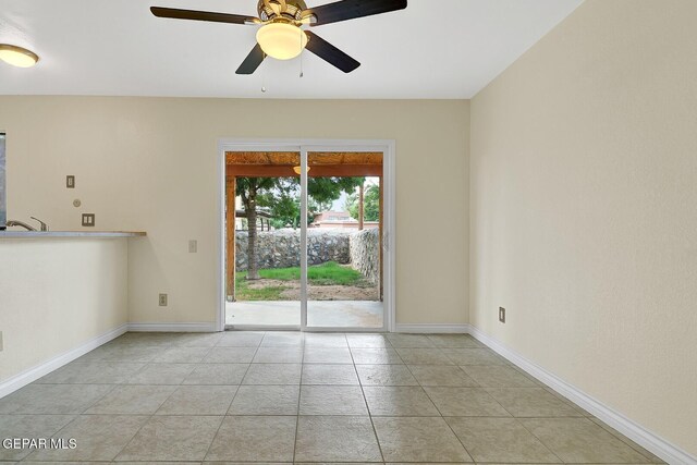 191 Mulberry Ave Unit G, El Paso, TX 79932 - unfurnished room featuring ceiling fan, light tile patterned floors, and baseboards