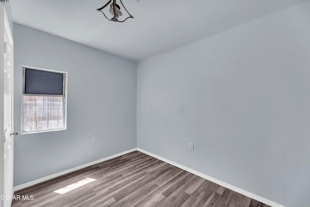 4301 Hueco Ave, El Paso, TX 79903 - empty room featuring wood finished floors and baseboards