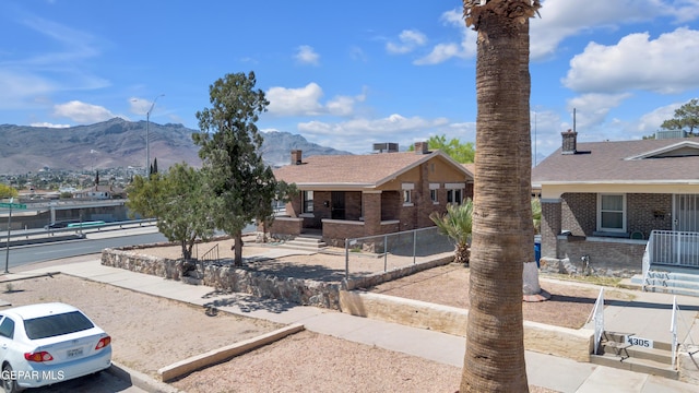 4301 Hueco Ave, El Paso, TX 79903 - single story home featuring a mountain view and brick siding