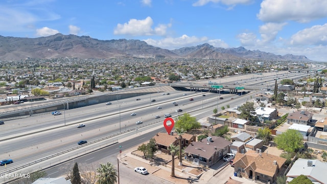 4301 Hueco Ave, El Paso, TX 79903 - aerial view of property and surrounding area with a major roadway, nearby suburban area, and mountains