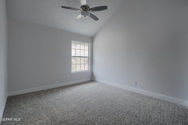 7413 Le Conte Dr, El Paso, TX 79912 - empty room featuring lofted ceiling, a textured ceiling, carpet floors, a ceiling fan, and baseboards