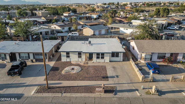 9029 Geranium Dr, El Paso, TX 79907 - aerial perspective of suburban area with a mountainous background