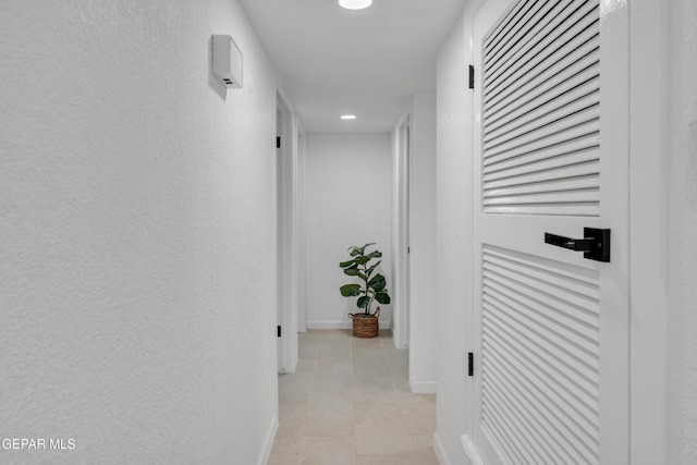 9029 Geranium Dr, El Paso, TX 79907 - hall with recessed lighting, baseboards, and light tile patterned flooring