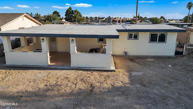 9029 Geranium Dr, El Paso, TX 79907 - rear view of property with covered porch
