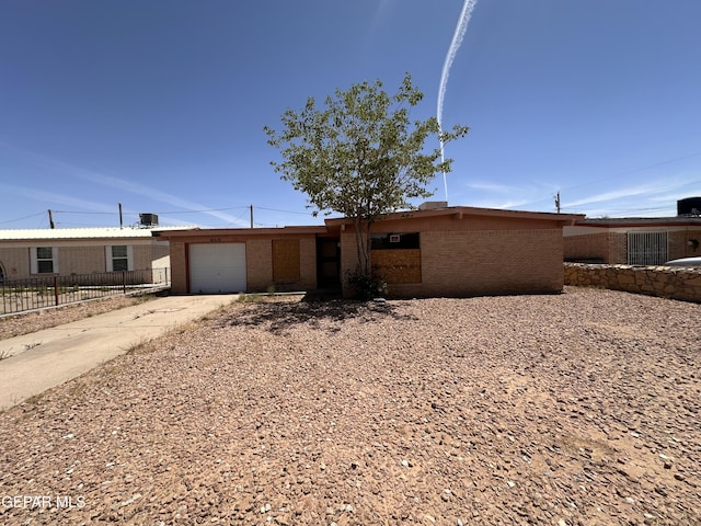 10612 Elsa Pl, El Paso, TX 79924 - single story home featuring brick siding, fence, driveway, and an attached garage