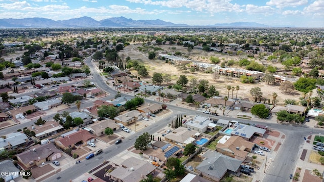 1664 Lou Graham Dr, El Paso, TX 79936 - aerial view of property's location featuring a mountain backdrop and nearby suburban area