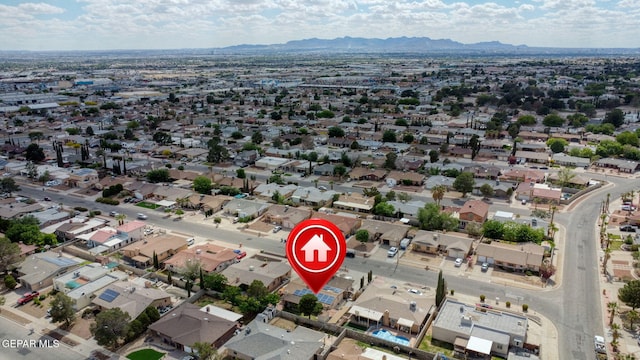 1664 Lou Graham Dr, El Paso, TX 79936 - aerial view of property and surrounding area with a mountainous background and nearby suburban area