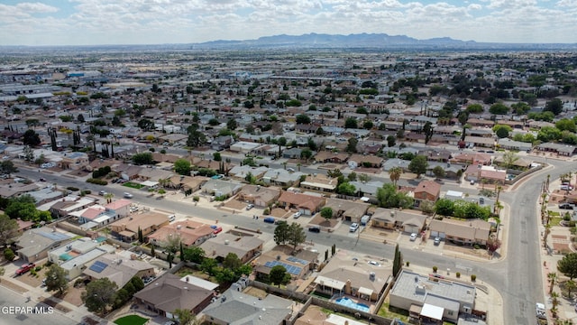1664 Lou Graham Dr, El Paso, TX 79936 - aerial view of property and surrounding area featuring a mountainous background and nearby suburban area