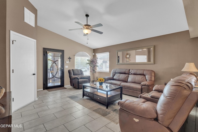 11129 Catherine Slutter Ln, Socorro, TX 79927 - living area with lofted ceiling, a ceiling fan, light tile patterned floors, and baseboards