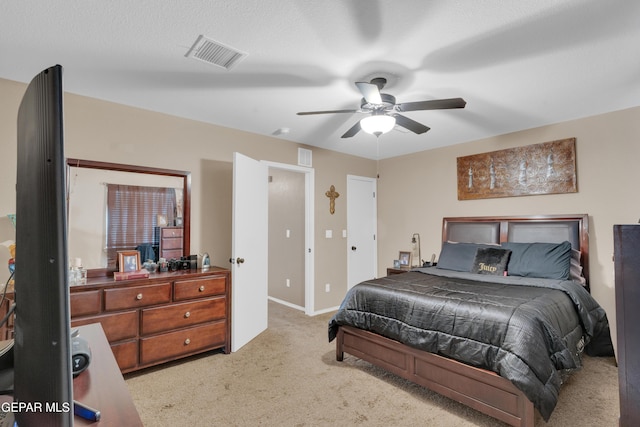11129 Catherine Slutter Ln, Socorro, TX 79927 - bedroom featuring light carpet, ceiling fan, and baseboards