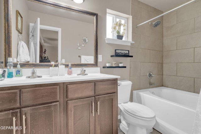 11129 Catherine Slutter Ln, Socorro, TX 79927 - bathroom with double vanity, toilet, and tub / shower combination