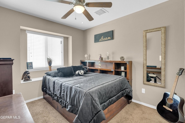 11129 Catherine Slutter Ln, Socorro, TX 79927 - carpeted bedroom with baseboards and a ceiling fan