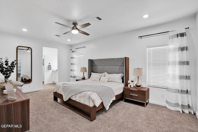 12849 Middlesbrough Ave, Horizon City, TX 79928 - bedroom featuring light colored carpet, baseboards, recessed lighting, a ceiling fan, and ensuite bathroom