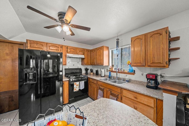 11968 Frances Scobee Dr, El Paso, TX 79936 - kitchen featuring black appliances, a sink, under cabinet range hood, ceiling fan, and tasteful backsplash