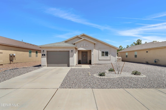 436 Sun Temple Rd, Socorro, TX 79927 - ranch-style home featuring driveway, stucco siding, and a garage