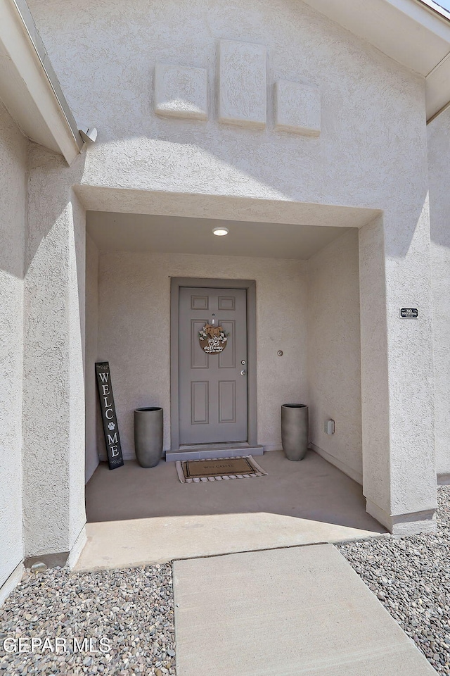 436 Sun Temple Rd, Socorro, TX 79927 - property entrance with stucco siding