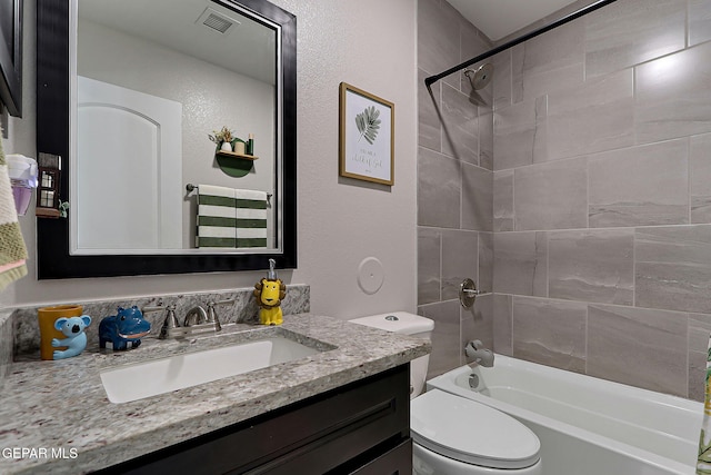 436 Sun Temple Rd, Socorro, TX 79927 - full bath with vanity, toilet, and shower / bath combination