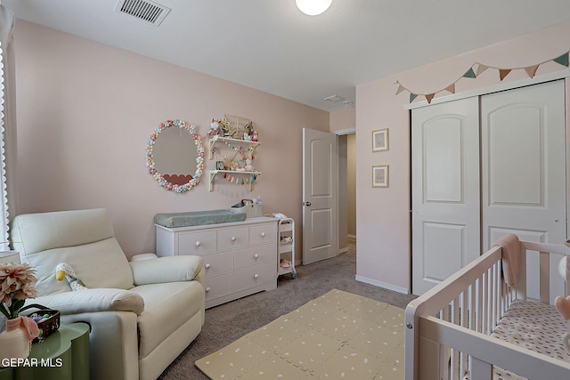 436 Sun Temple Rd, Socorro, TX 79927 - bedroom with carpet flooring, a closet, baseboards, and a nursery area