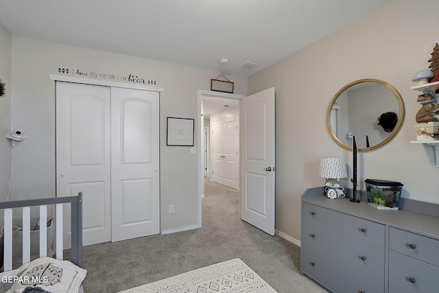 436 Sun Temple Rd, Socorro, TX 79927 - bedroom featuring light colored carpet, a closet, and baseboards