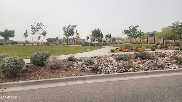 12869 Woolstone Dr, El Paso, TX 79928 - view of property's community with a yard and a residential view