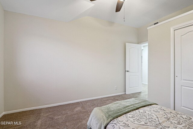 bedroom featuring carpet flooring, baseboards, and a ceiling fan
