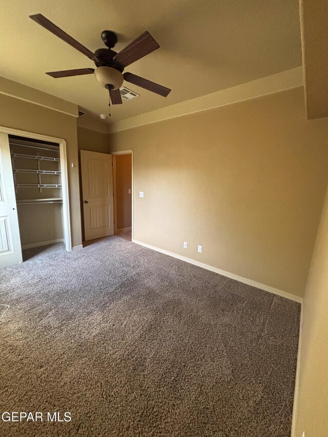 14215 Rattler Point Dr, El Paso, TX 79938 - unfurnished bedroom with carpet flooring, baseboards, a closet, and a ceiling fan