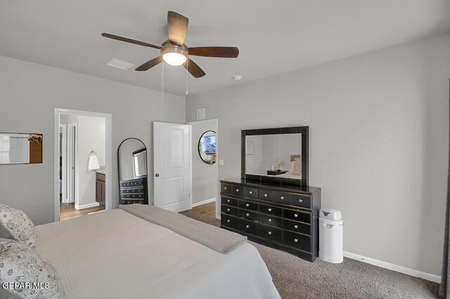 bedroom featuring baseboards, ceiling fan, and carpet floors