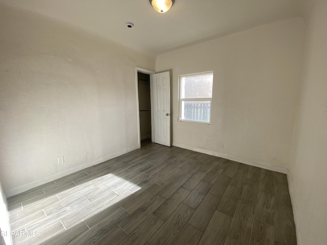 2805 Grant Ave, El Paso, TX 79930 - empty room featuring dark wood finished floors and baseboards