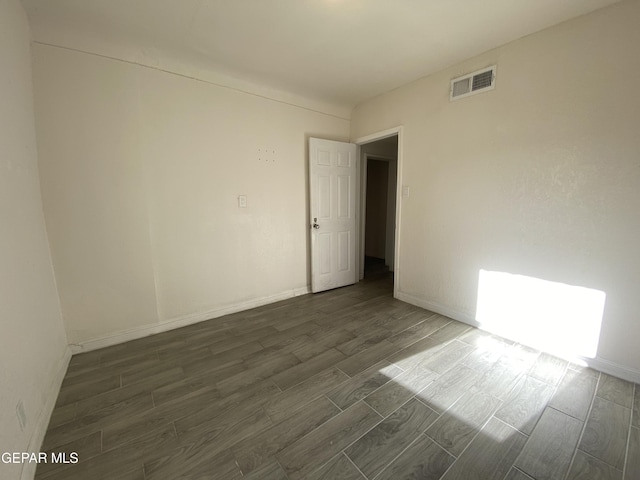 2805 Grant Ave, El Paso, TX 79930 - empty room featuring wood tiled floors and baseboards