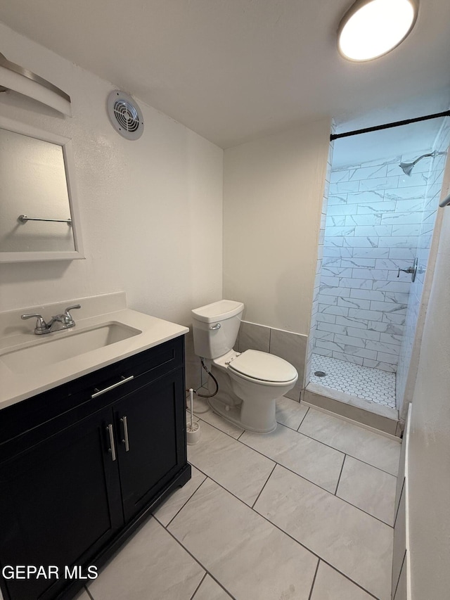 2805 Grant Ave, El Paso, TX 79930 - bathroom with a stall shower, toilet, and vanity