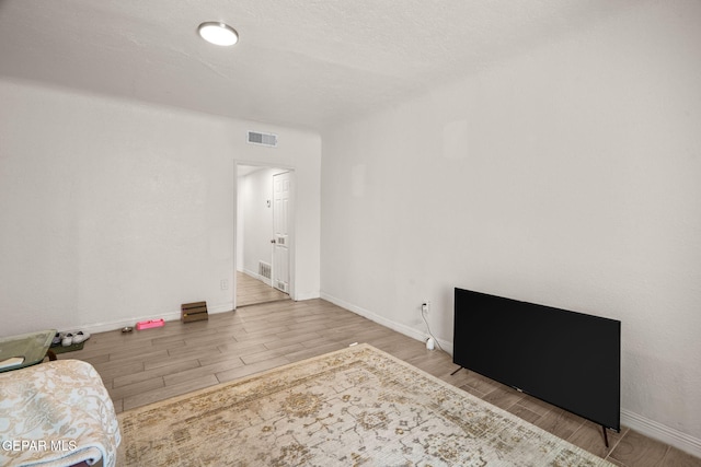 2805 Grant Ave, El Paso, TX 79930 - empty room with wood finished floors and baseboards