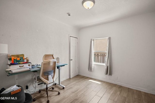 2805 Grant Ave, El Paso, TX 79930 - office area with wood finished floors and baseboards