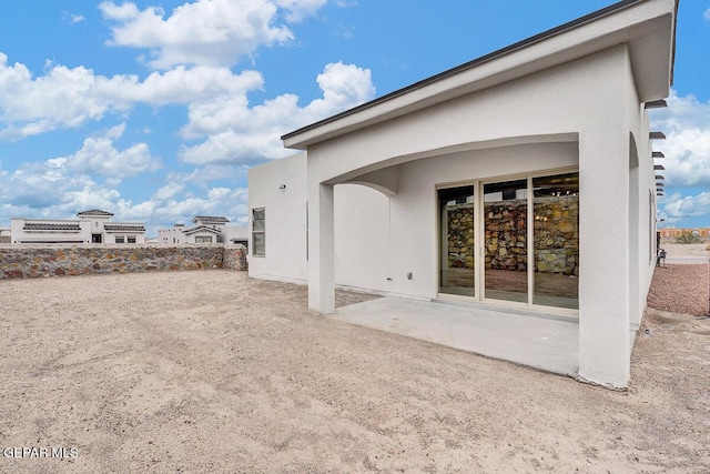 3825 Aspire Pl, El Paso, TX 79938 - rear view of property featuring a patio area and stucco siding