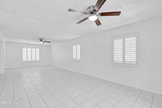 7701 Hermosillo Dr, El Paso, TX 79915 - unfurnished room featuring ceiling fan and a textured ceiling