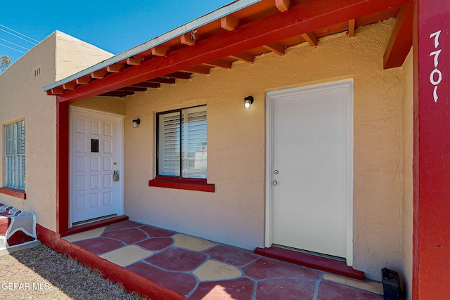 7701 Hermosillo Dr, El Paso, TX 79915 - doorway to property featuring stucco siding
