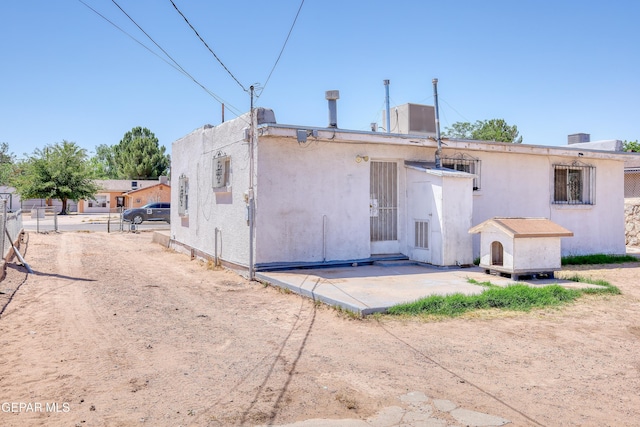 159 Silvas Way, El Paso, TX 79907 - back of house with a patio area and stucco siding